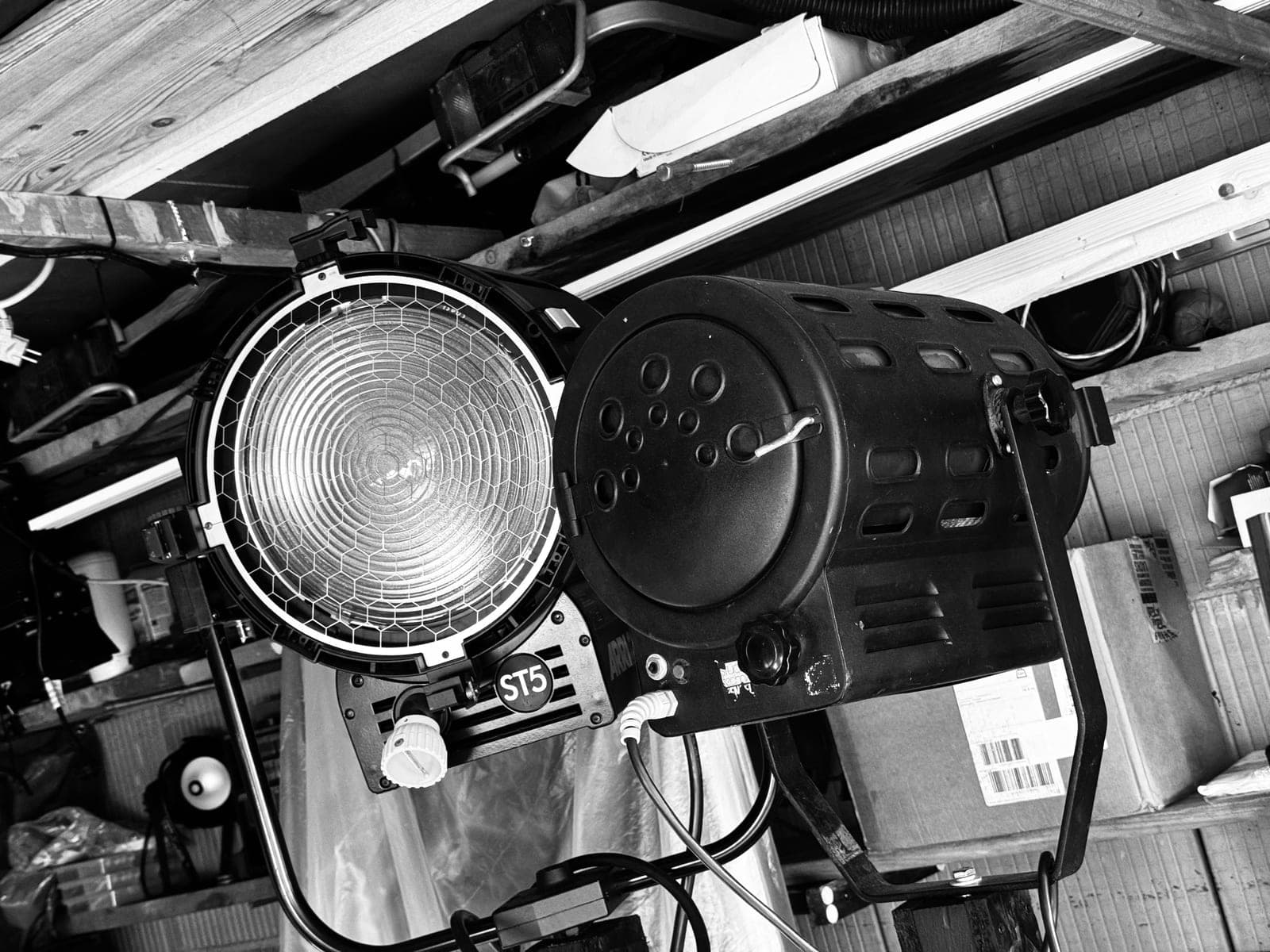 ARRI ST5 fresnel studio lamp hanging in the workshop